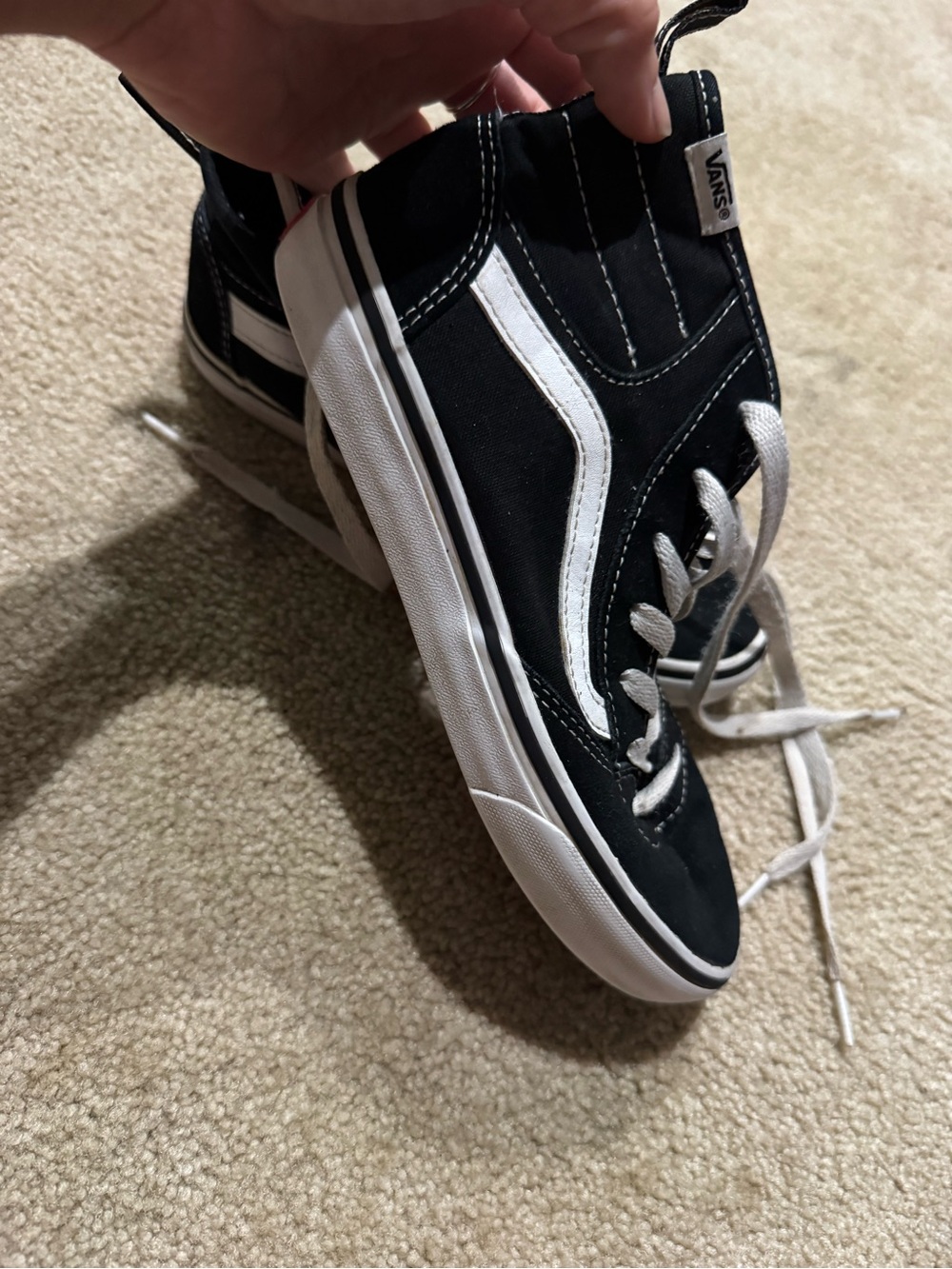 Vans Black and White High-Top Skate Sneakers